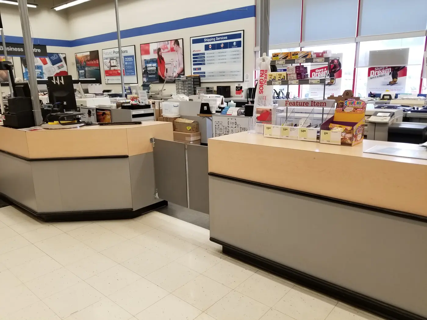 Retail store service counter — active commercial space requiring coordinated repair work.