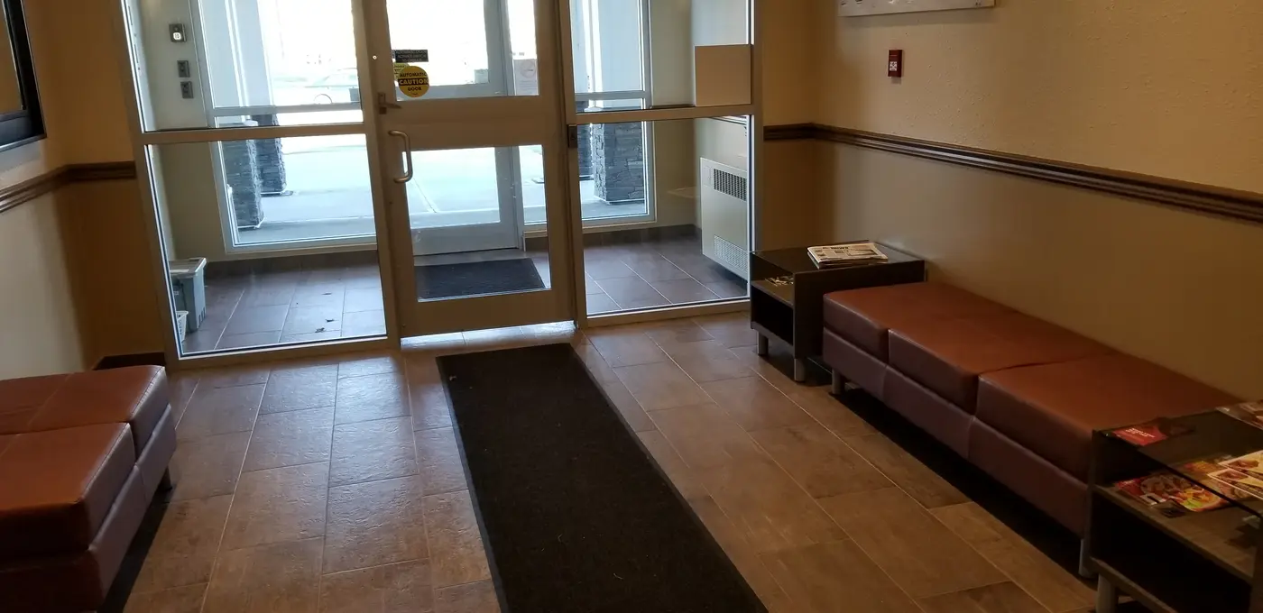 Commercial building lobby entrance — representing tenant-occupied repair environments.