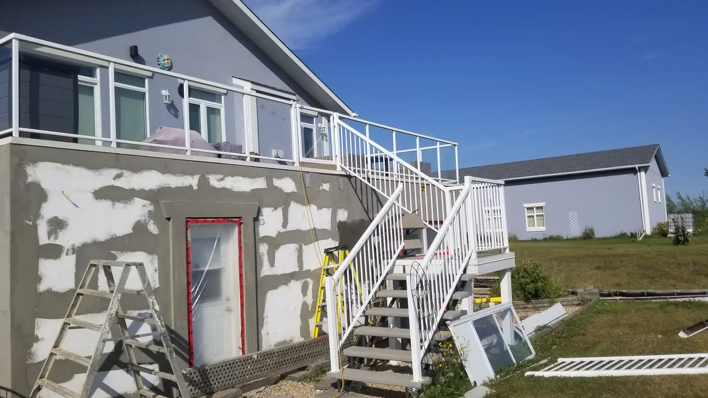 Concealed repair conditions at building exterior documented for scope support