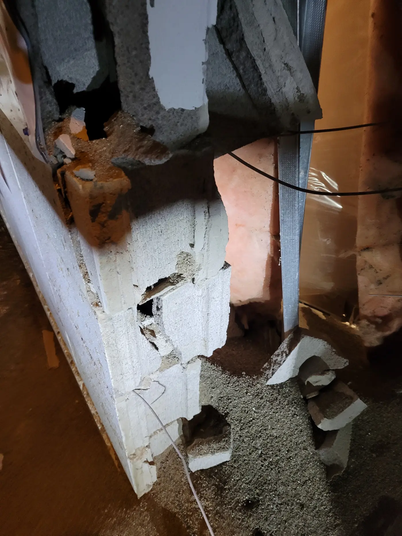 Vehicle impact damage through the rear block wall